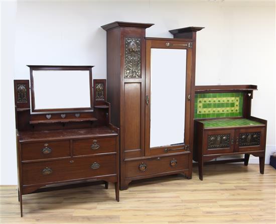 A Shapland & Petter Arts & Crafts three piece mahogany bedroom suite,